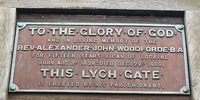 The plaque above the lychgate at Locking Parish Church